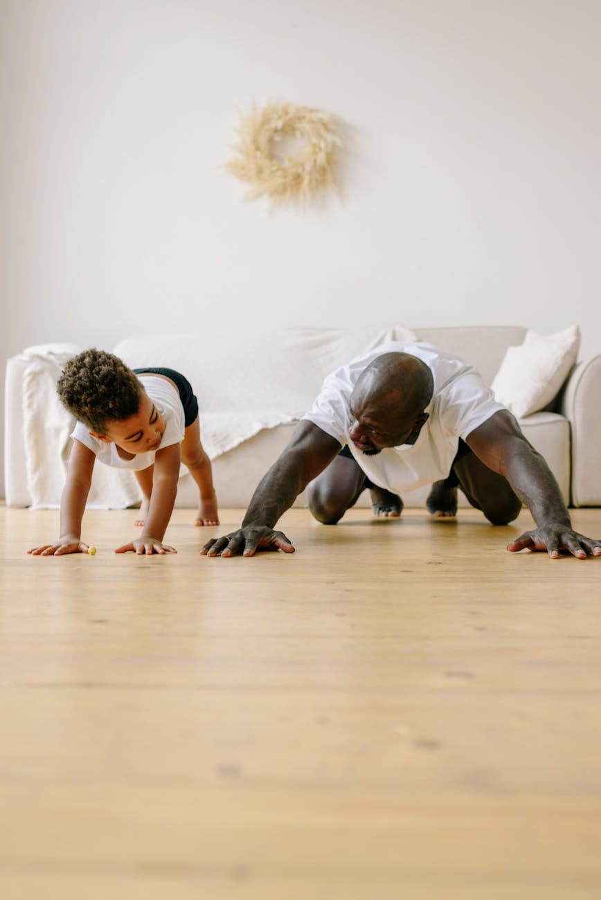 a father and son exercising