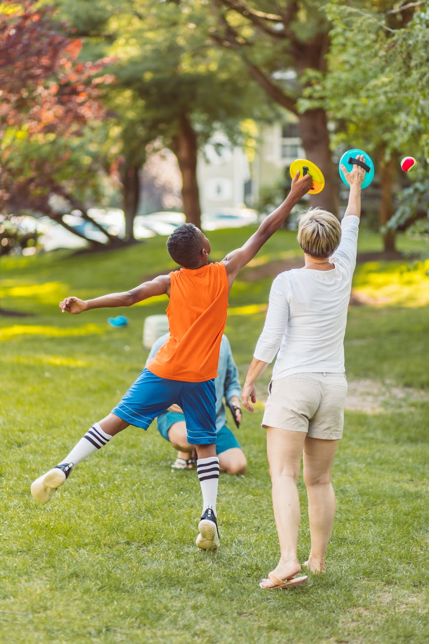 a family playing outdoors